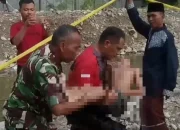 Binmas Poris Plawad Aipda Komarudin dibantu Babinsa Upaya Evakuasi Korban Tenggelam di Danau Galian 